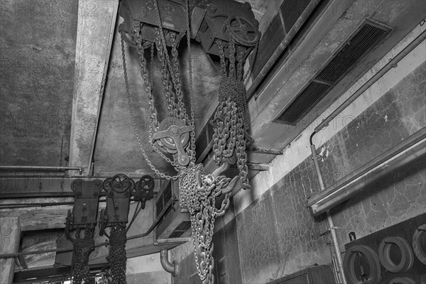 Chains from a pulley block of a former paper factory