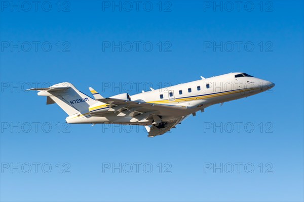 A private Bombardier Challenger 300 aircraft with registration N723JM at West Palm Beach Airport