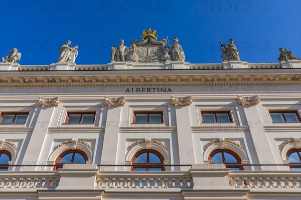 Golden Crown and Marble Statues on the Roof of the Albertina