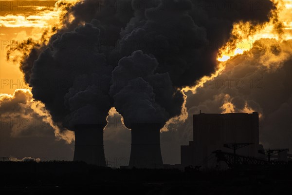 The Schwarze Pumpe coal-fired power plant stands out against the rising sun