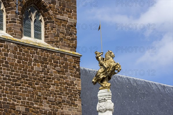 Gilded equestrian statue remembering the Battle of the Silver Helmets