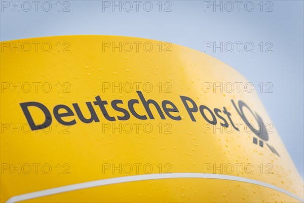 The logo of the Deutsche Post AG company at a distribution centre in Hanover