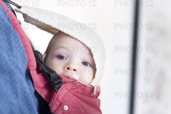Subject: Toddler in a baby carrier