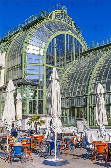 Closed cafe at the Palm House with green glass roof