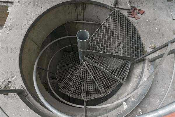 Iron turning staircase to the lower frabrication hall of a former paper factory