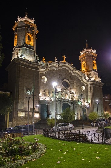 Cathedral Basilica of Our Lady of Peace in Neoclassical style at the plaza 10 de Noviembre at night in the city Potosi