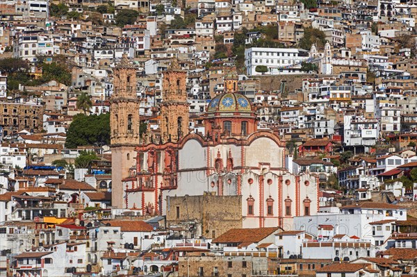 View over the colonial city centre of Taxco de Alarcon and the 18th century Church of Santa Prisca