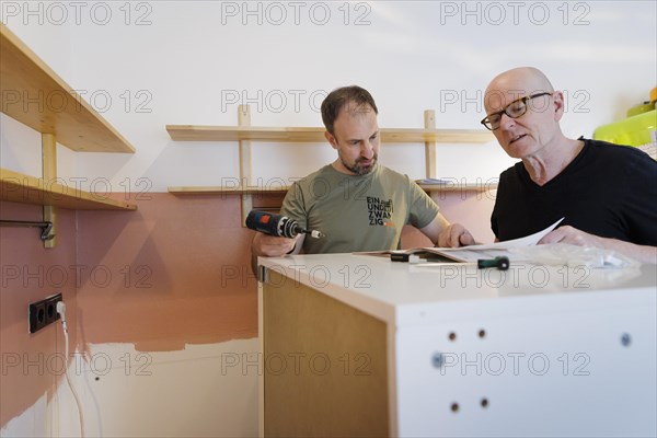 Subject: Construction of a kitchen according to a construction plan