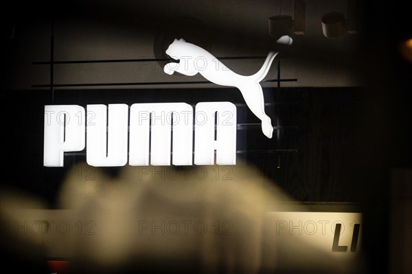 The logo of the sporting goods manufacturer PUMA in a branch in Berlin