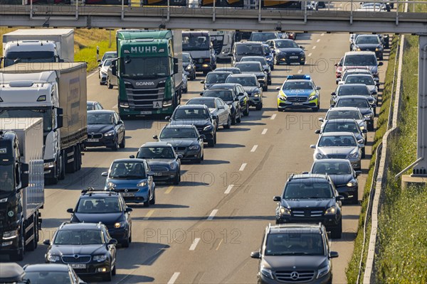 Police vehicle driving through an emergency lane