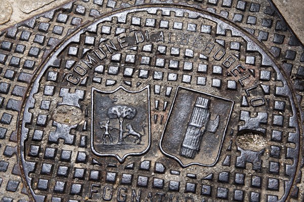 Manhole cover with symbols