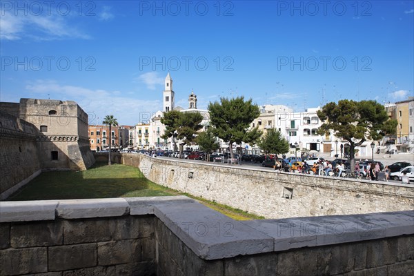 View over the moat of Castello Normanno-Svevo to the tower of San Sabino Cathedral in Bari