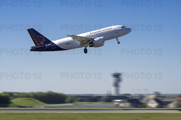 Airbus A319-111 from Brussels Airlines taking off from runway at the Brussels-National airport