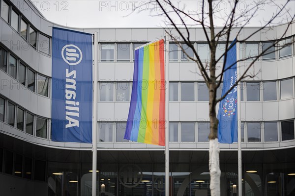 Flags of Allianz stand in front of their location in Berlin. 04.02.2022.