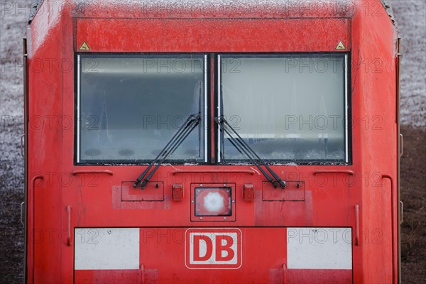 An electric locomotive of DB Cargo stands in the freight station Halle