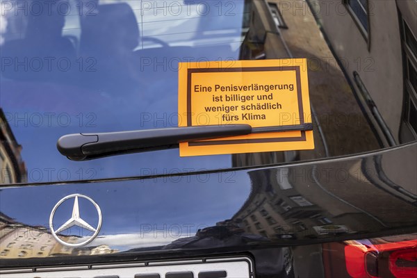 Penis extension instead of SUV: note under the windscreen wiper of a high-powered vehicle