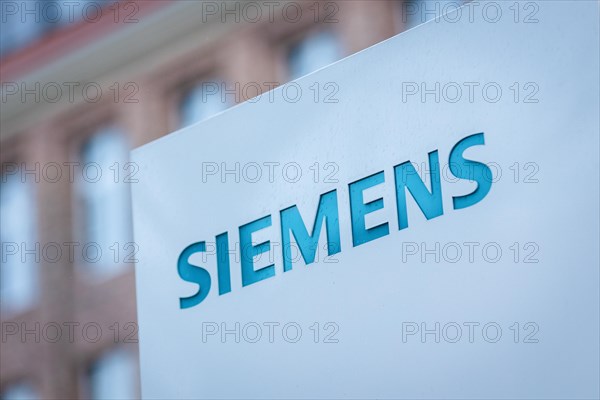 A Siemens company sign in front of a branch office in Siemensstadt in Berlin