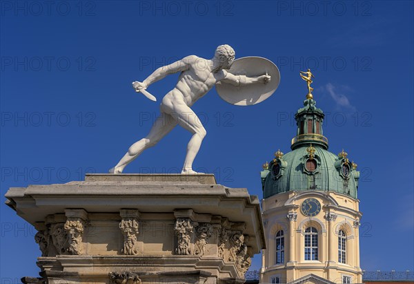 Statue of naked warriors in front of the main entrance to Charlottenburg Palace