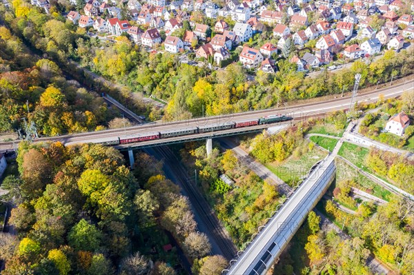 Historic crocodile type locomotive train on the viaduct of the Gaeubahn aerial view in Stuttgart