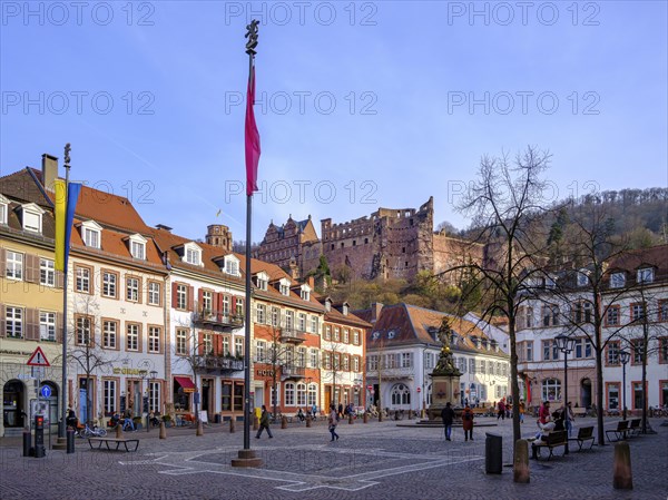 Lively scene on the Kornmarkt in the old town of Heidelberg