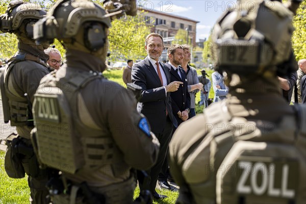 Federal Minister of Finance Christian Lindner with members of the special unit Zentrale Unterstuetzungsgruppe Zoll