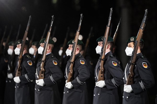 Soldiers wearing mouth-nose protection from the Guard Battalion of the German Armed Forces