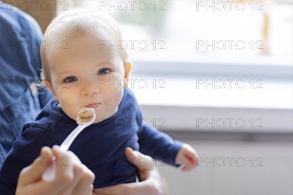 Subject: Children aged nine months are fed porridge