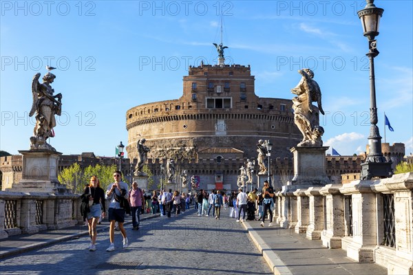 Tourists on the Aelius Bridge to Castel Sant'Angelo