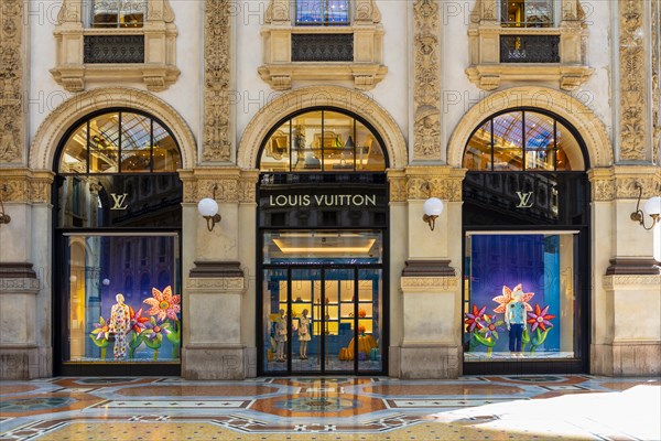 Shop window of the luxury shop LOUIS VUITTON at Galleria Vittorio Emanuele II