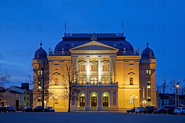 Illuminated Mecklenburg State Theatre in the evening