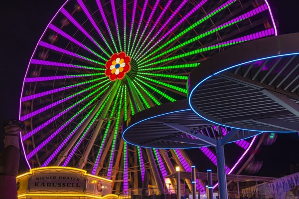 Illuminated flower wheel at the Prater