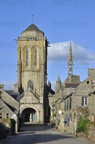 Old picturesque houses and the Saint Ronan church at Locronan