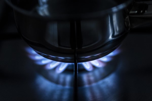 A blue flame on a gas cooker