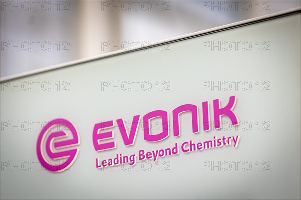 A sign of the evonik company at their headquarters in Essen