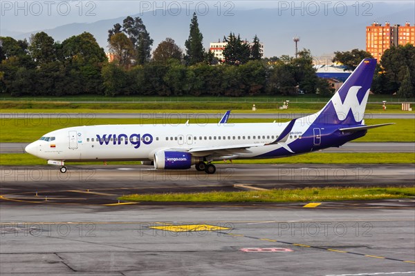 A Wingo Boeing 737-800 aircraft with registration number HP-1536CMP at Bogota Airport