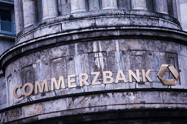 A Commerzbank lettering is seen above the entrance of a branch in Duesseldorf