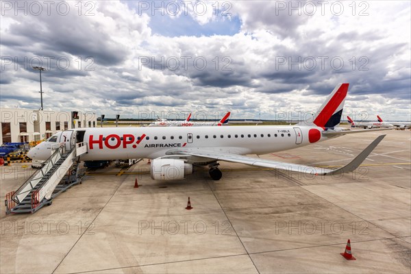 An Embraer 190 aircraft of Hop! Air France with registration F-HBNC at Paris Charles de Gaulle Airport