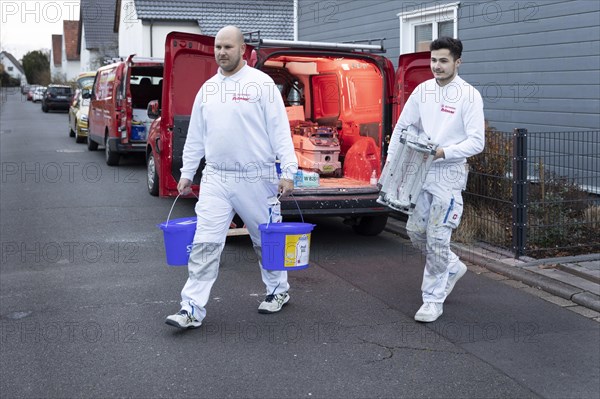 Subject: Master painter and apprentice on their way to work