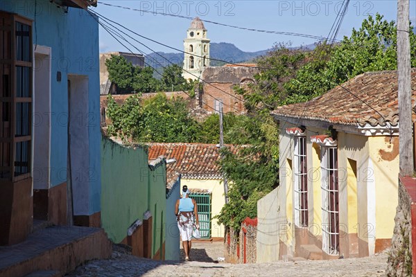 Pastel coloured houses with grilles and bell tower of the Iglesia y Convento de San Francisco