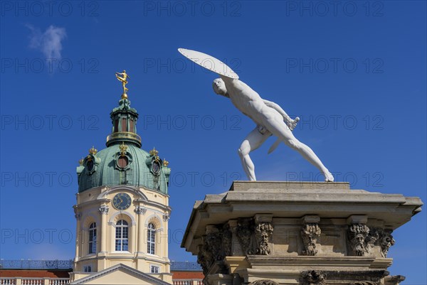 Statue of naked warriors in front of the main entrance to Charlottenburg Palace