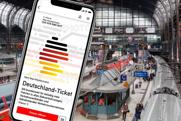 Germany ticket D-ticket or 49 euro ticket on a mobile phone Photo montage at Hamburg Central Station