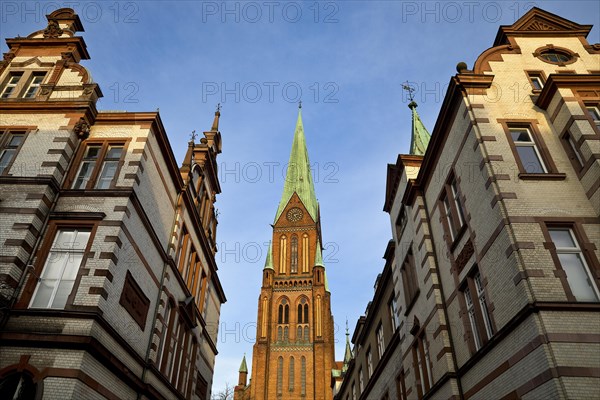 View of Schwerin Cathedral St. Marien and St. Johannis from an old town alley