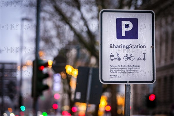 A traffic sign indicates a designated parking place for two-wheeled rental vehicles in Duesseldorf