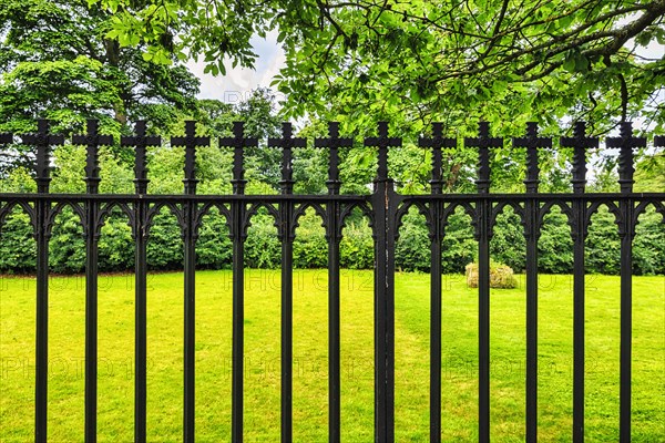 Wrought iron fence with crosses