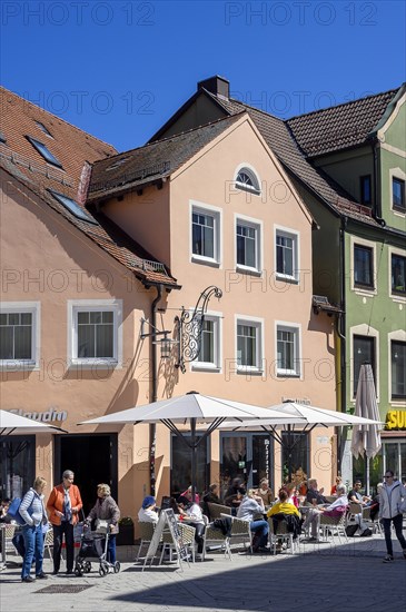 Pointed gable houses with street cafe