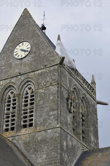 Parachute Memorial in honour of paratrooper John Steele who was caught on the church spire during D-Day