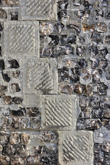 Detail showing sandstone and flint as building material of the Saint Jacques church at Le Treport