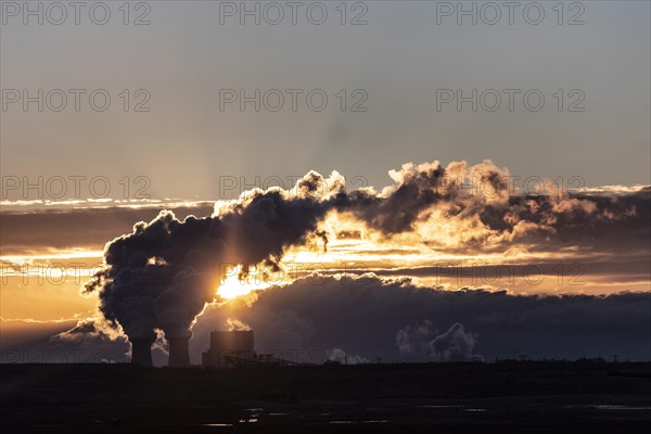 The Schwarze Pumpe coal-fired power plant stands out against the rising sun