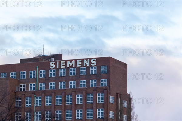 A lettering of the Siemens company on a branch in the Siemensstadt in Berlin