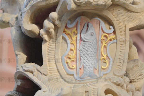 City coat of arms with heraldic animal at the Schoene Brunnen